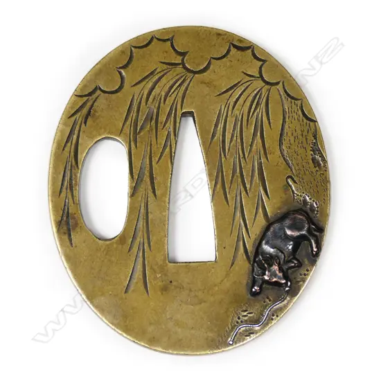 An oval Edo period tanto tsuba in sentoku bronze c.1800,