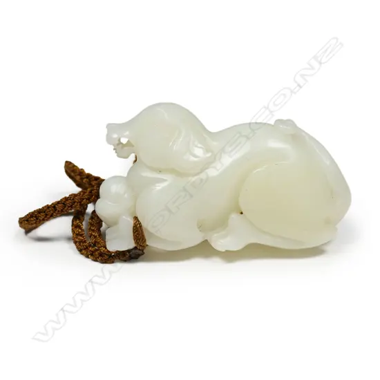 A quality Chinese white hetian jade mythical beast handling piece,