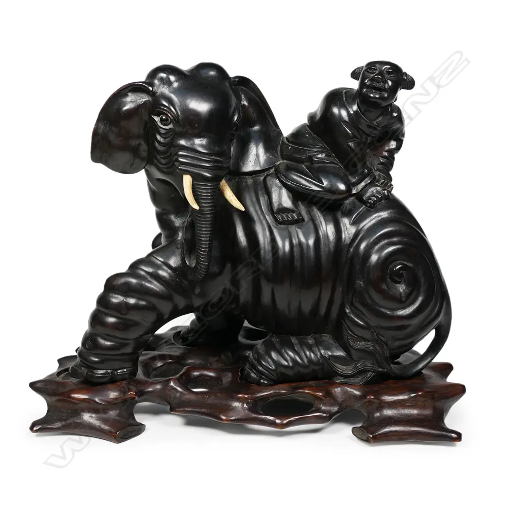 A good old characterfully carved Chinese rosewood model of a seated elephant , Image 1++