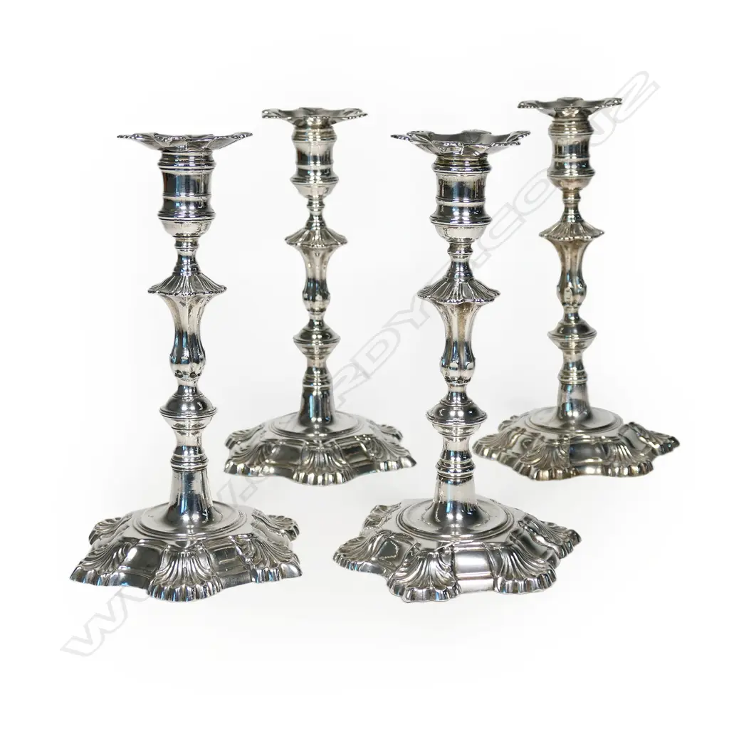 A rare set of four early George III cast silver candlesticks, Image 1++