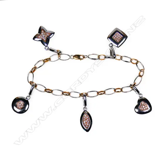 A 9ct and 18ct white and yellow gold diamond set charm type bracelet,
