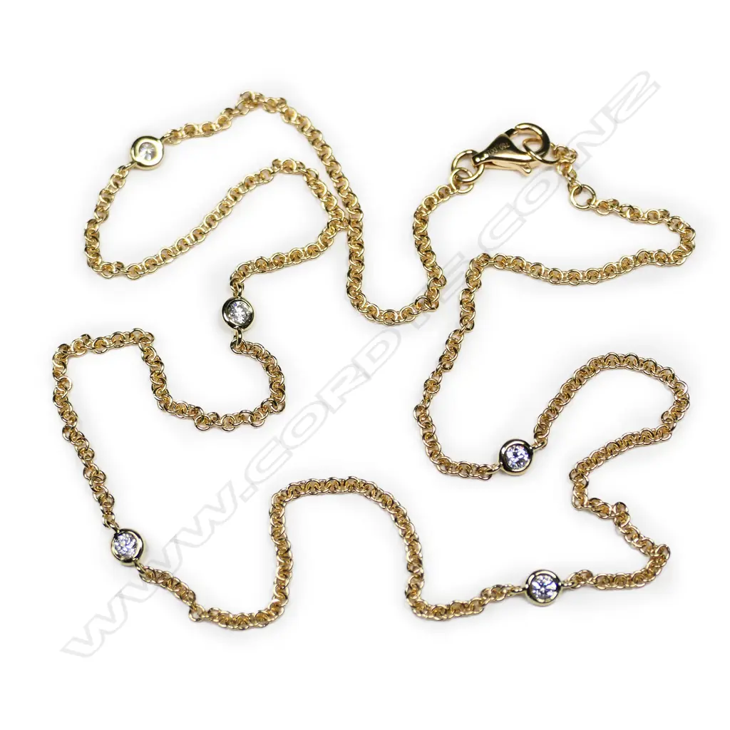 An 18ct gold and diamond set chain necklace, Image 1++