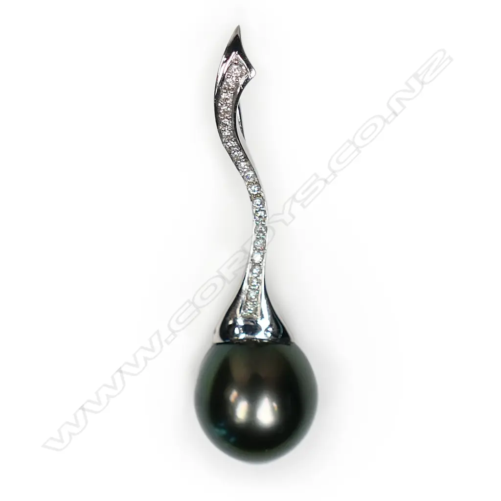 An 18ct white gold diamond and South Seas cultured black pearl pendant, Image 1++