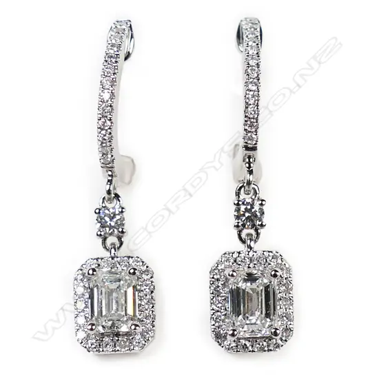 A pair of 18ct white gold and diamond earrings,