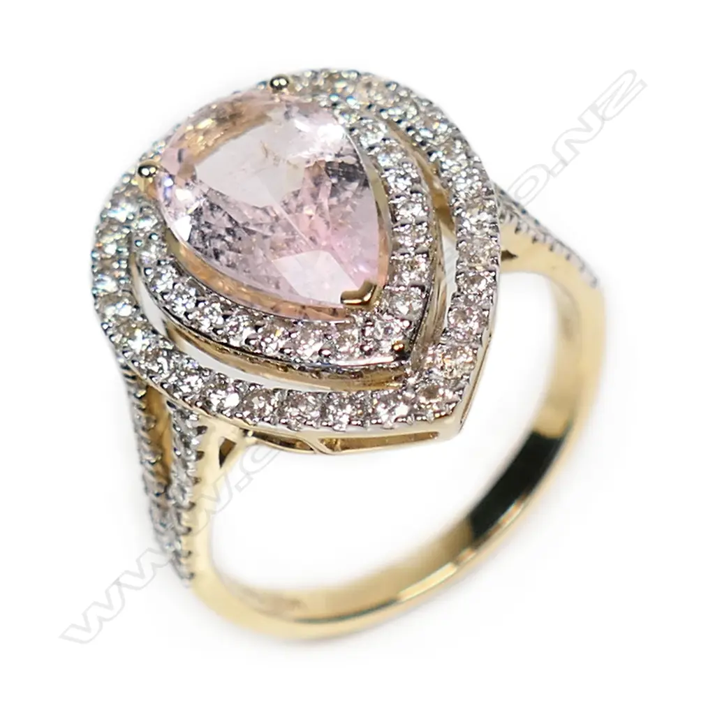 A 14ct gold morganite and diamond double halo ring, Image 1++