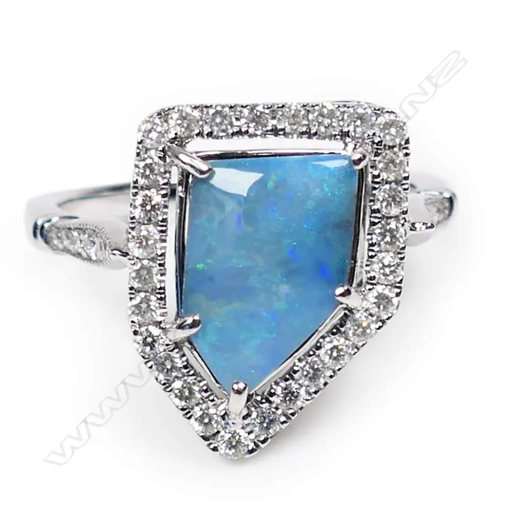 A 14ct white gold opal and diamond cocktail ring, Image 1++