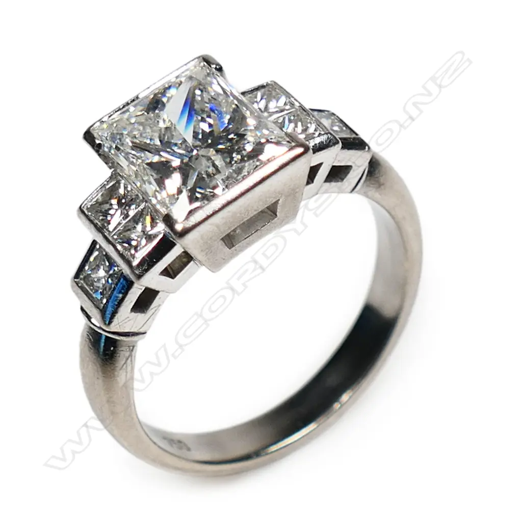 An 18ct white gold and diamond Art Deco style solitaire ring, Image 1++