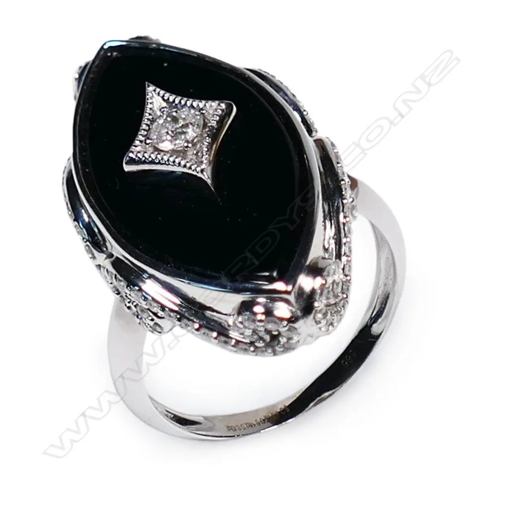 A 14ct white gold onyx and diamond ring, Image 1++