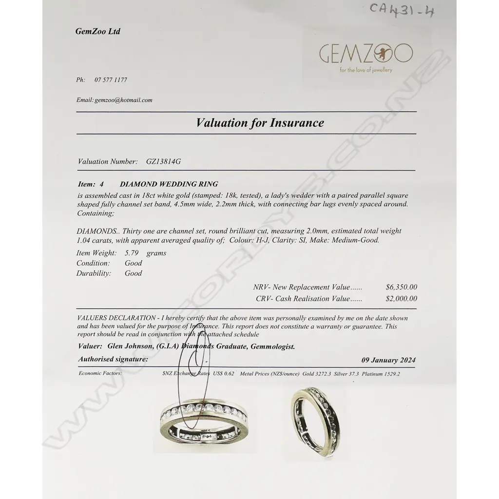 An 18ct white gold and diamond band, Image 1++