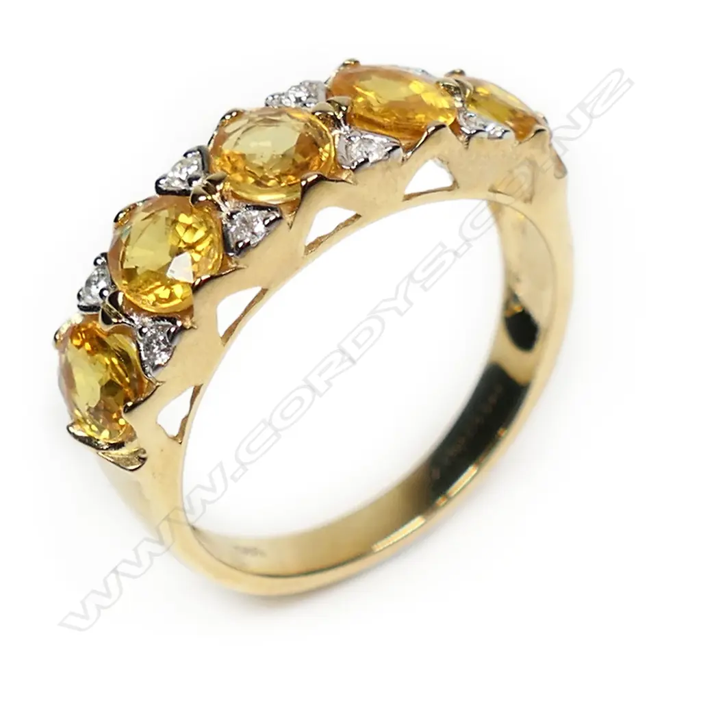 A 14ct gold yellow sapphire and diamond ring, Image 1++