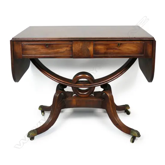 An elegant Regency period flame mahogany sofa table,