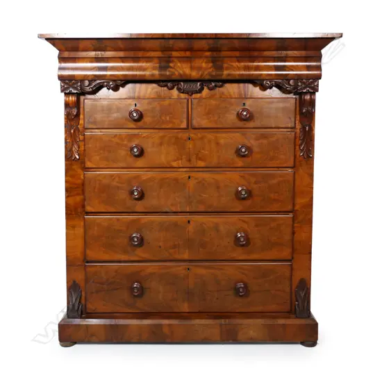 A Victorian flame mahogany scotch type chest,