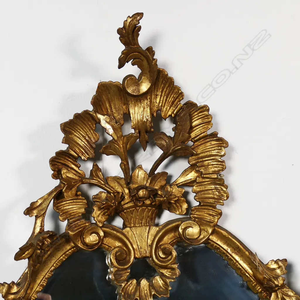 A French style carved giltwood framed elaborate wall mirror, Image 1++