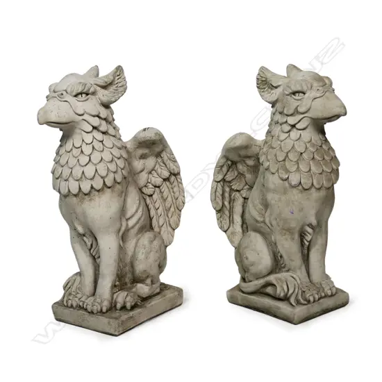 A pair of fine concrete garden/entrance seated griffins,