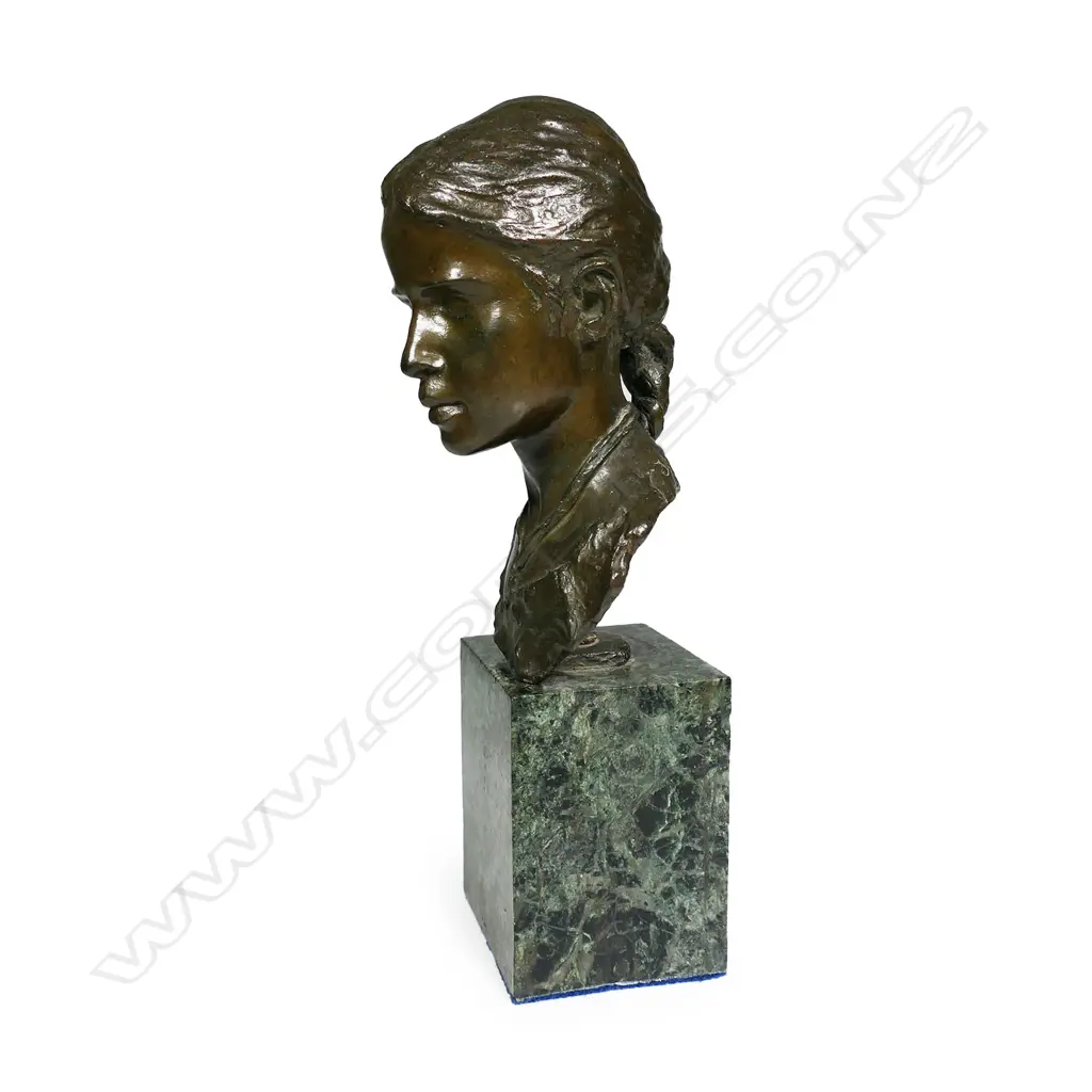 An early 1900s bronze bust of a young woman, Image 1++