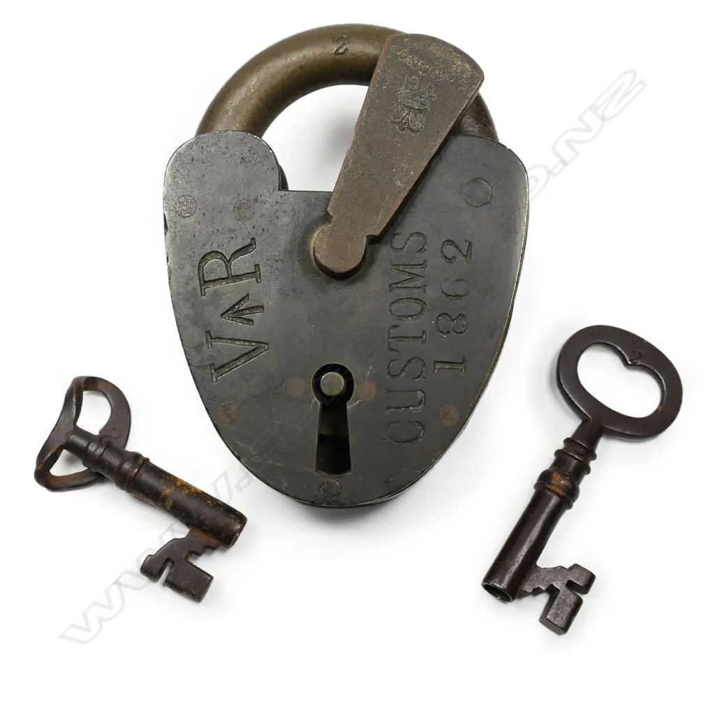 An 1862 VR Customs and military marked brass padlock. Image 1++