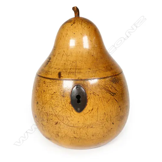 A rare 19thC fruitwood carved pear form tea caddy,