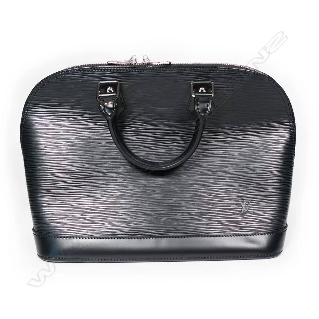 A Louis Vuitton Alma handbag, Image 1++