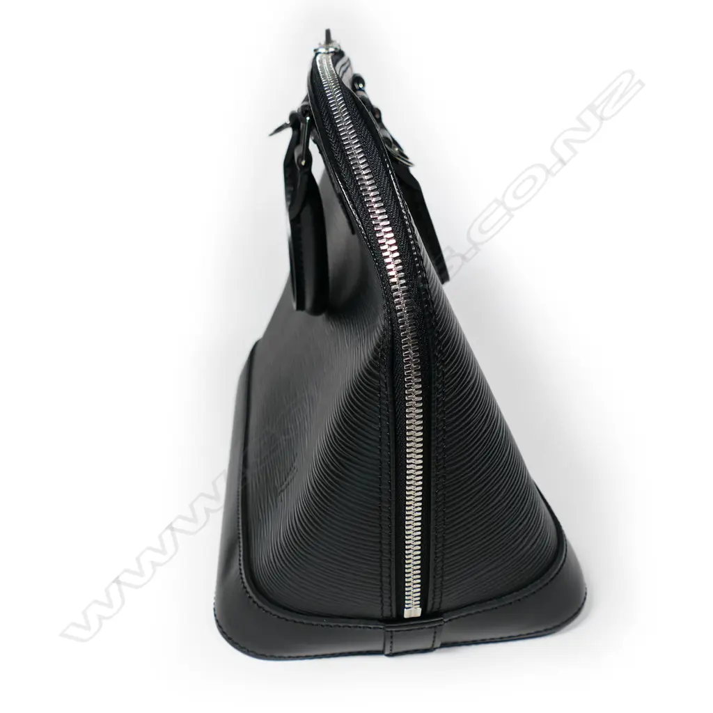 A Louis Vuitton Alma handbag, Image 1++