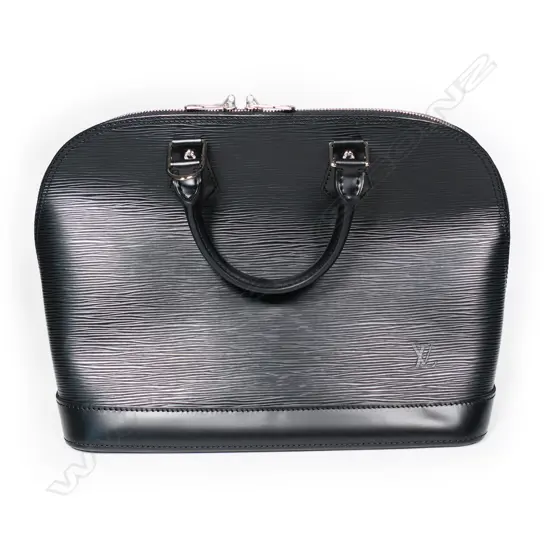 A Louis Vuitton Alma handbag,
