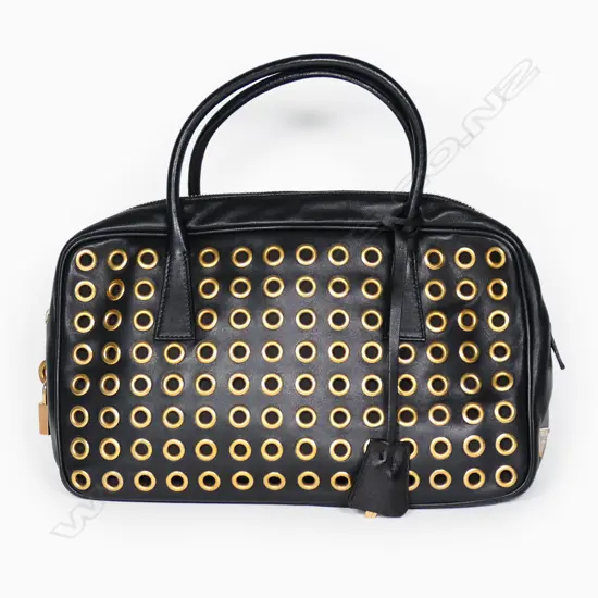 A Prada Eyelet bag,