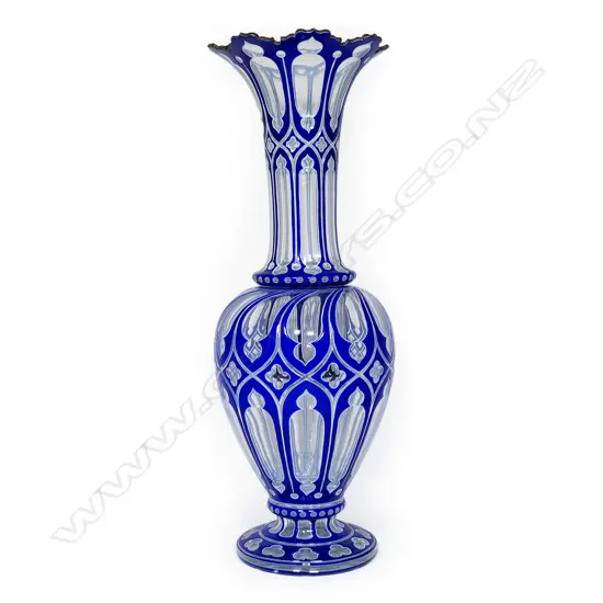 A tall 19thC Bohemian blue and white flashed two section vase,