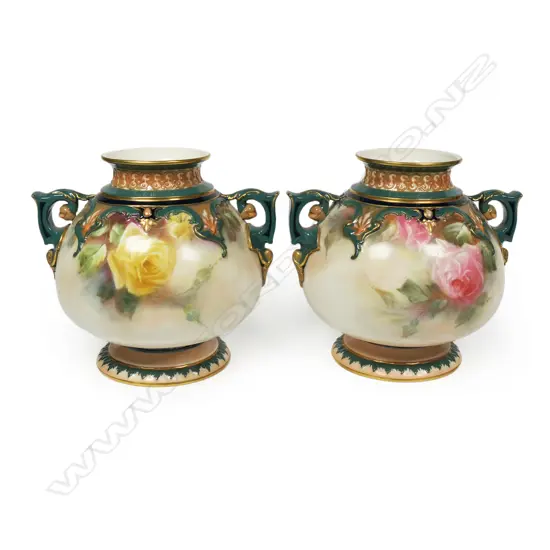 A pair of c.1900 Hadley's Worcester squat baluster vases,