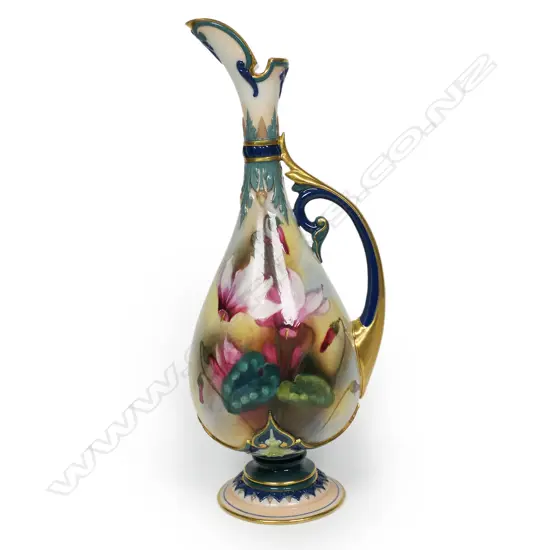 An attractive hand painted and gilded small Royal Worcester ewer,