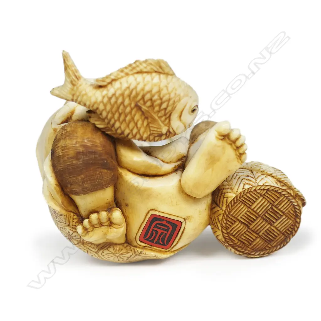 A Meiji Japanese carved ivory okimono of a fisherman, Image 1++