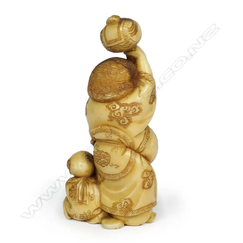 A Meiji Japanese carved marine ivory okimono of Daikokuten, Image 1++