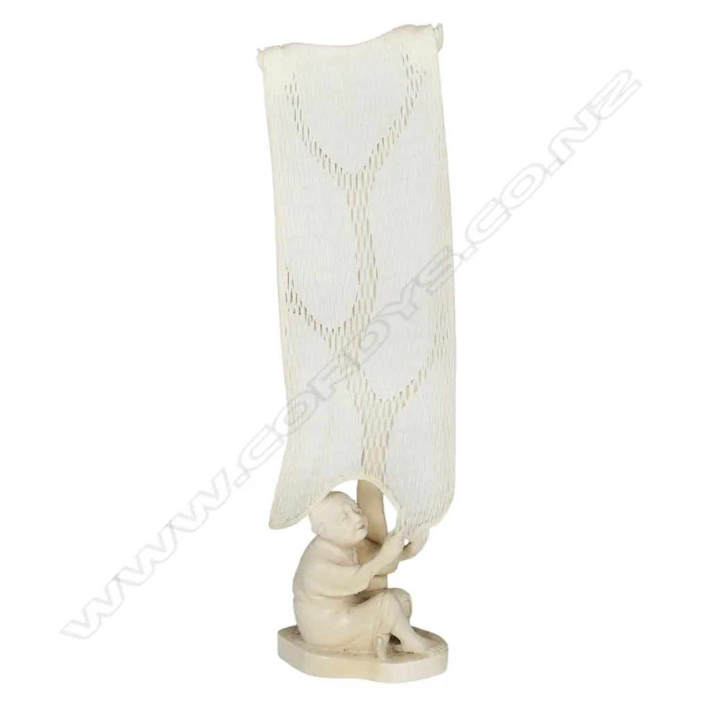 An old Japanese carved ivory okimono of a fisherman mending his large net, Image 1++