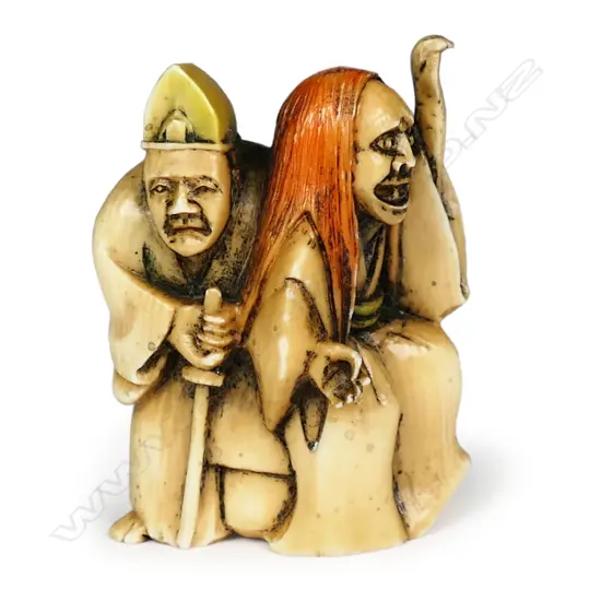 A Japanese carved ivory netsuke,