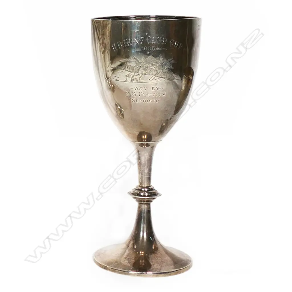 The New Zealand historic 'H.B. HUNT CLUB CUP 1905' - presentation engraved 'Won by E. S. Petits ‘MEPHISTO’, engraved with three jumping horses and riders. Birmingham 1903. H.270mm. 440gms. Image 1++