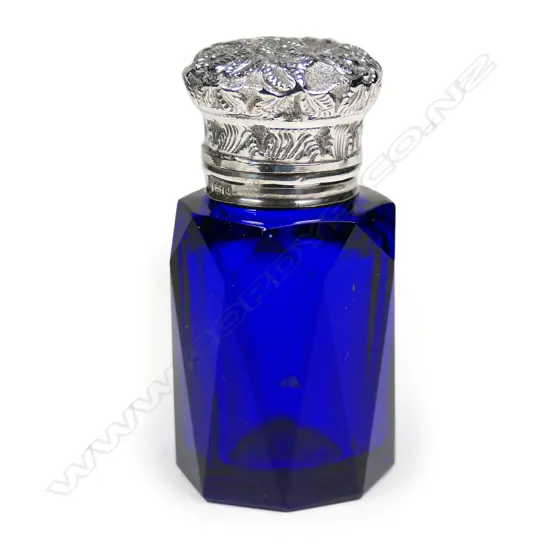 An Edwardian silver topped Bristol blue glass scent bottle,