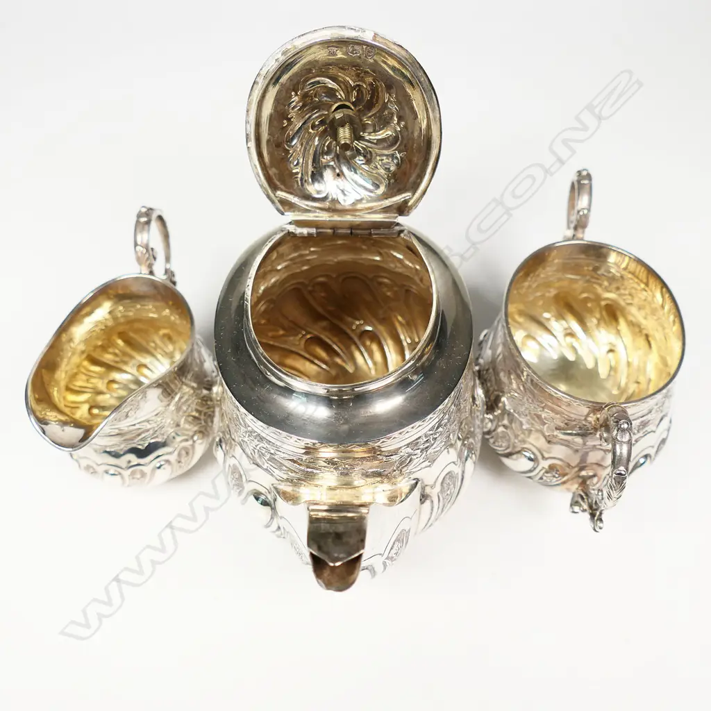 A late Victorian silver three-piece bachelor's tea service, Image 1++