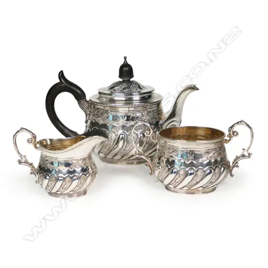 A late Victorian silver three-piece bachelor's tea service,