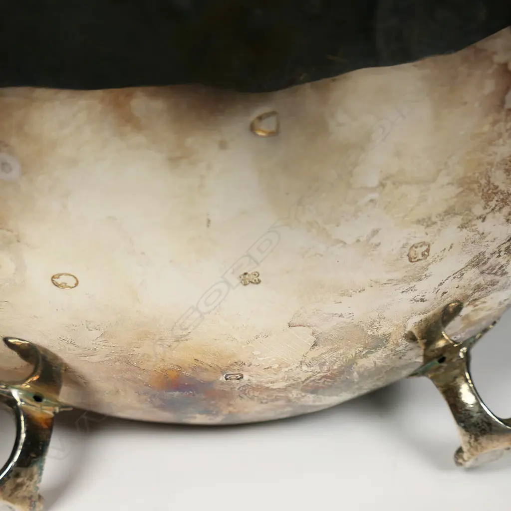 A decorative Victorian silver embossed teapot, Image 1++