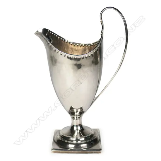 A George III silver helmet form cream jug,