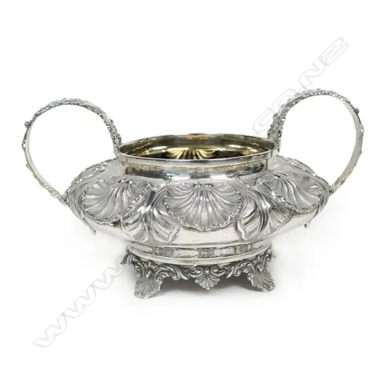 A George IV silver fancy shell embossed sugar bowl,