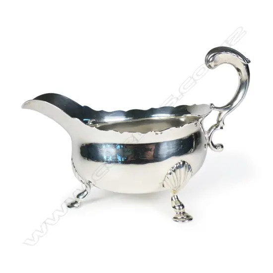A George II quality silver fat bellied sauce boat,