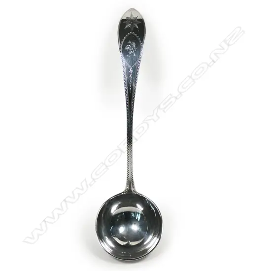 A quality late Victorian George III revival bright cut soup ladle,