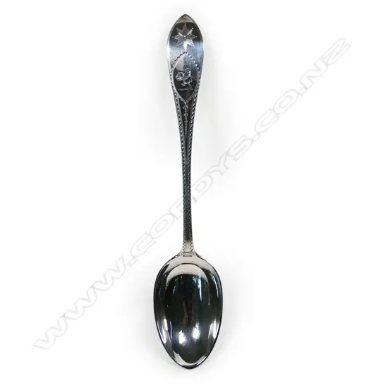 A quality late Victorian George III revival bright cut pie spoon,