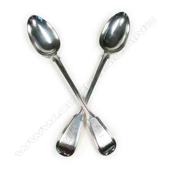 A pair of George IV silver serving spoons,