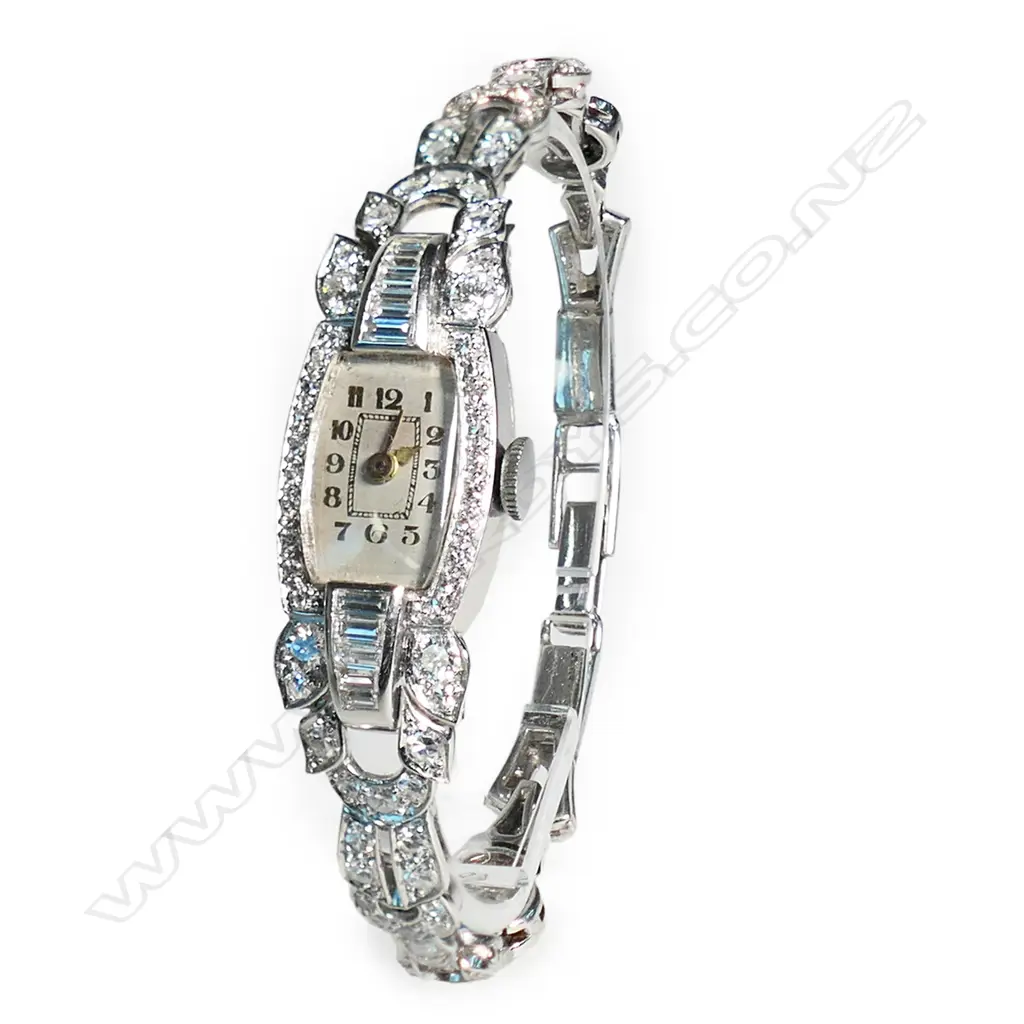 An Art Deco platinum and diamond ladies dress wrist watch, Image 1++