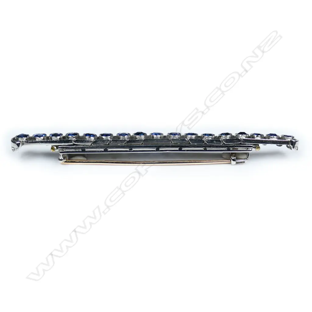 A platinum and sapphire bar brooch, Image 1++