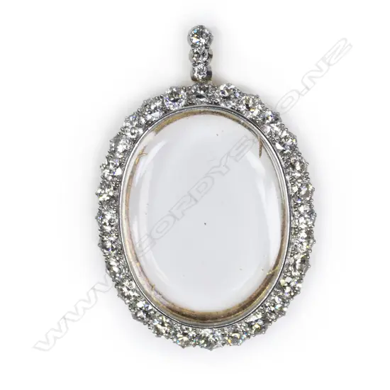 An antique 18ct gold 31 diamond set pendant,
