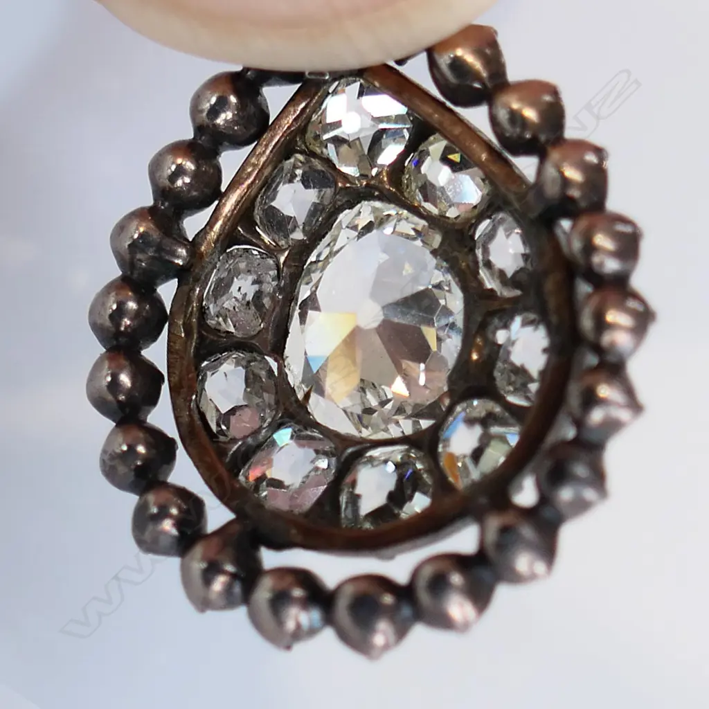 An antique 9ct gold and diamond pendant on 18ct gold chain, Image 1++