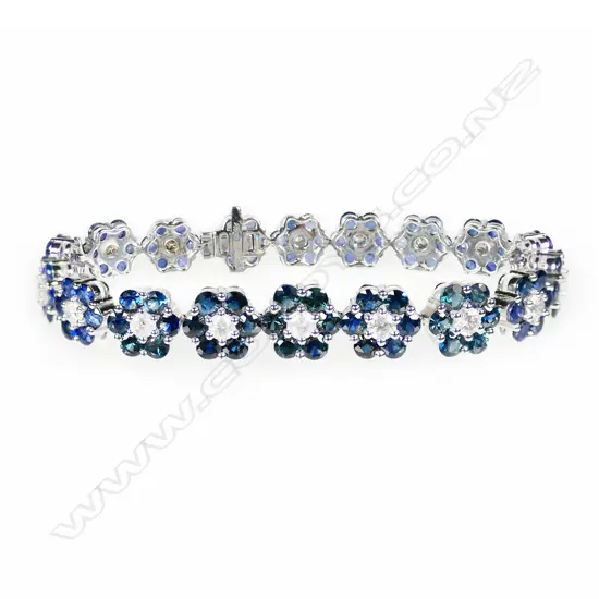A 14ct white gold sapphire and diamond floral cluster bracelet,