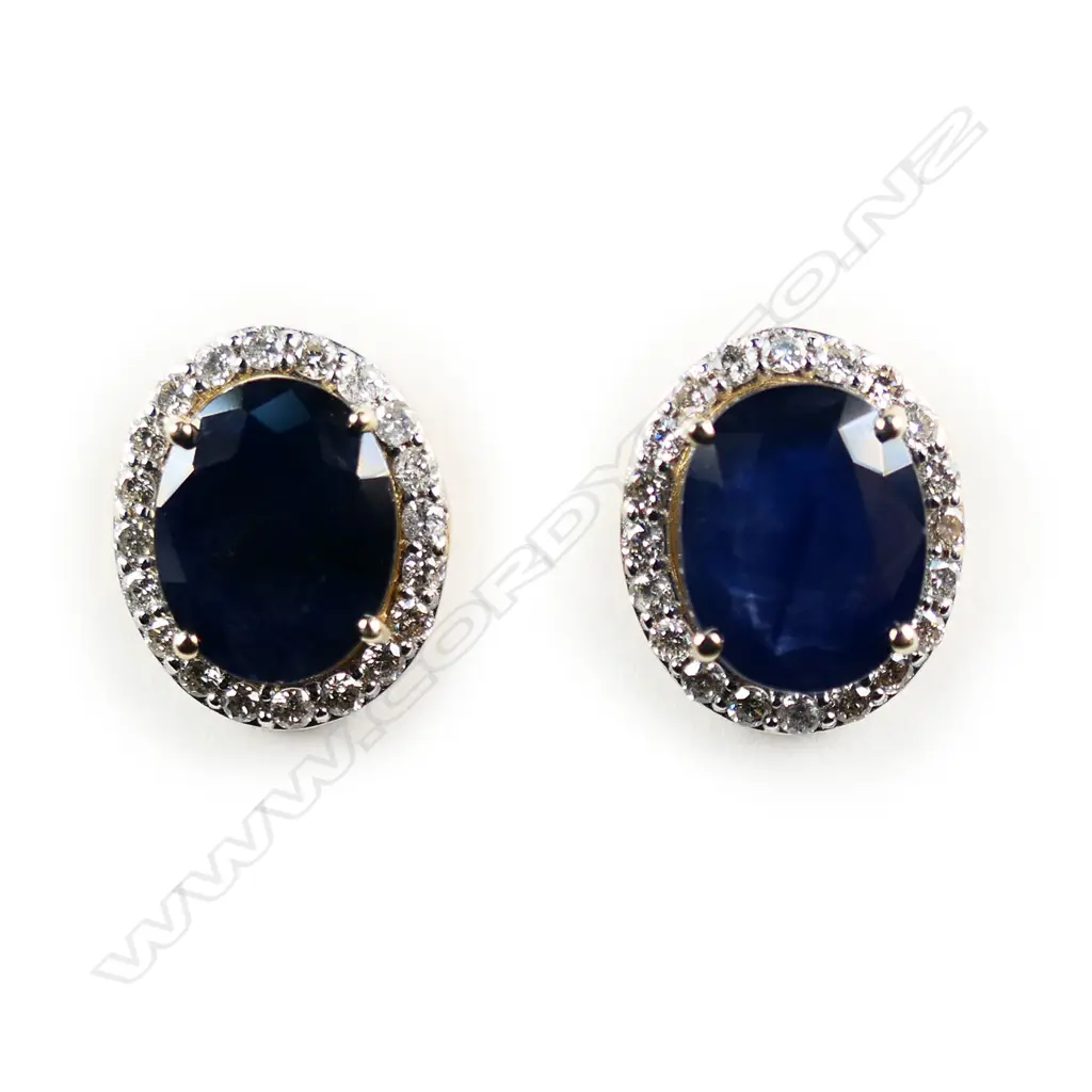 A pair of 14ct gold sapphire and diamond halo stud earrings, Image 1++