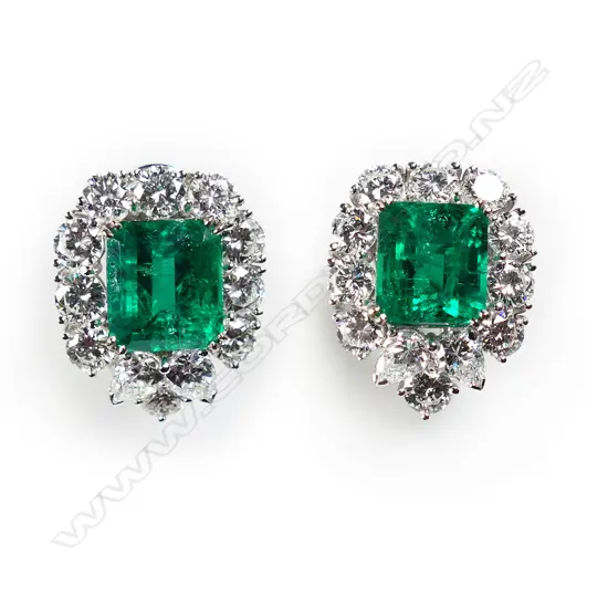 A pair of impressive 18ct white gold emerald and diamond earrings,